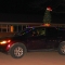 Photo: Car decorated with lighted Christmas tree