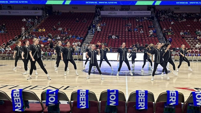 Golden Stars dancing at the Iowa Wolves game